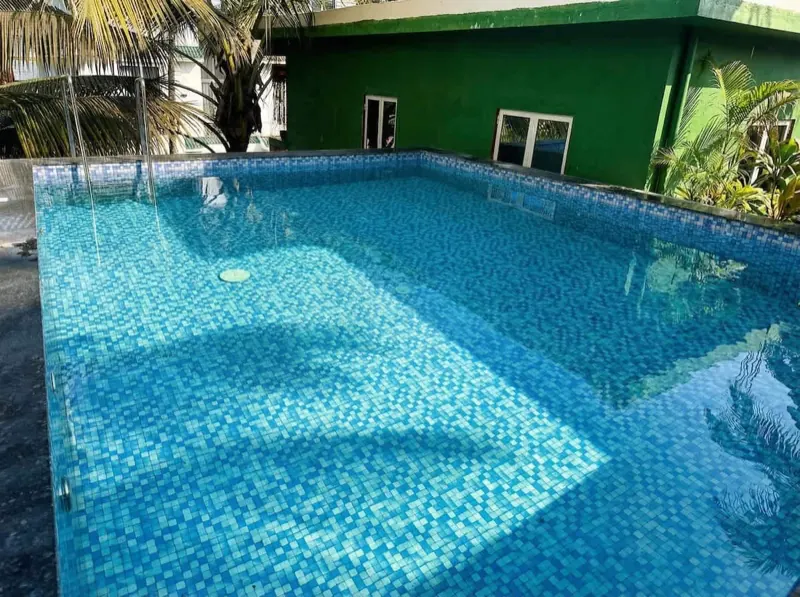 Blue tiled pool at Celeste Stay