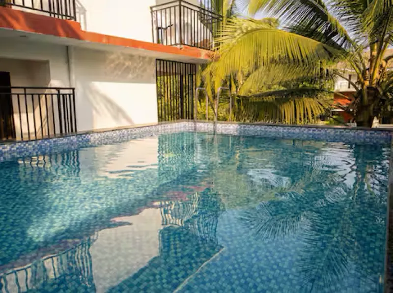 Pool reflecting the balconies above